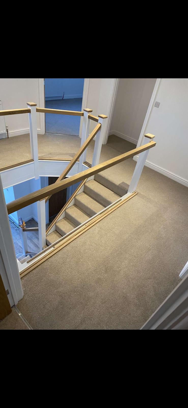 Carpet fitted on stairs and landing by Compass Flooring Norfolk